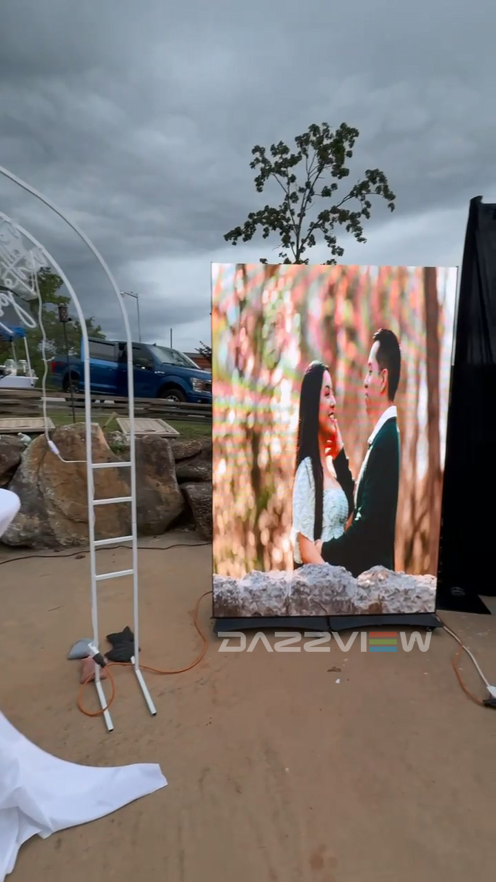 Dposter LED poster display used at an outdoor wedding in the USA
